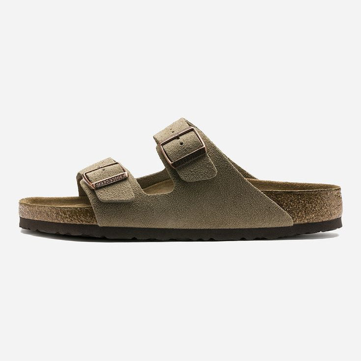Brown sandal with cork sole on a white background