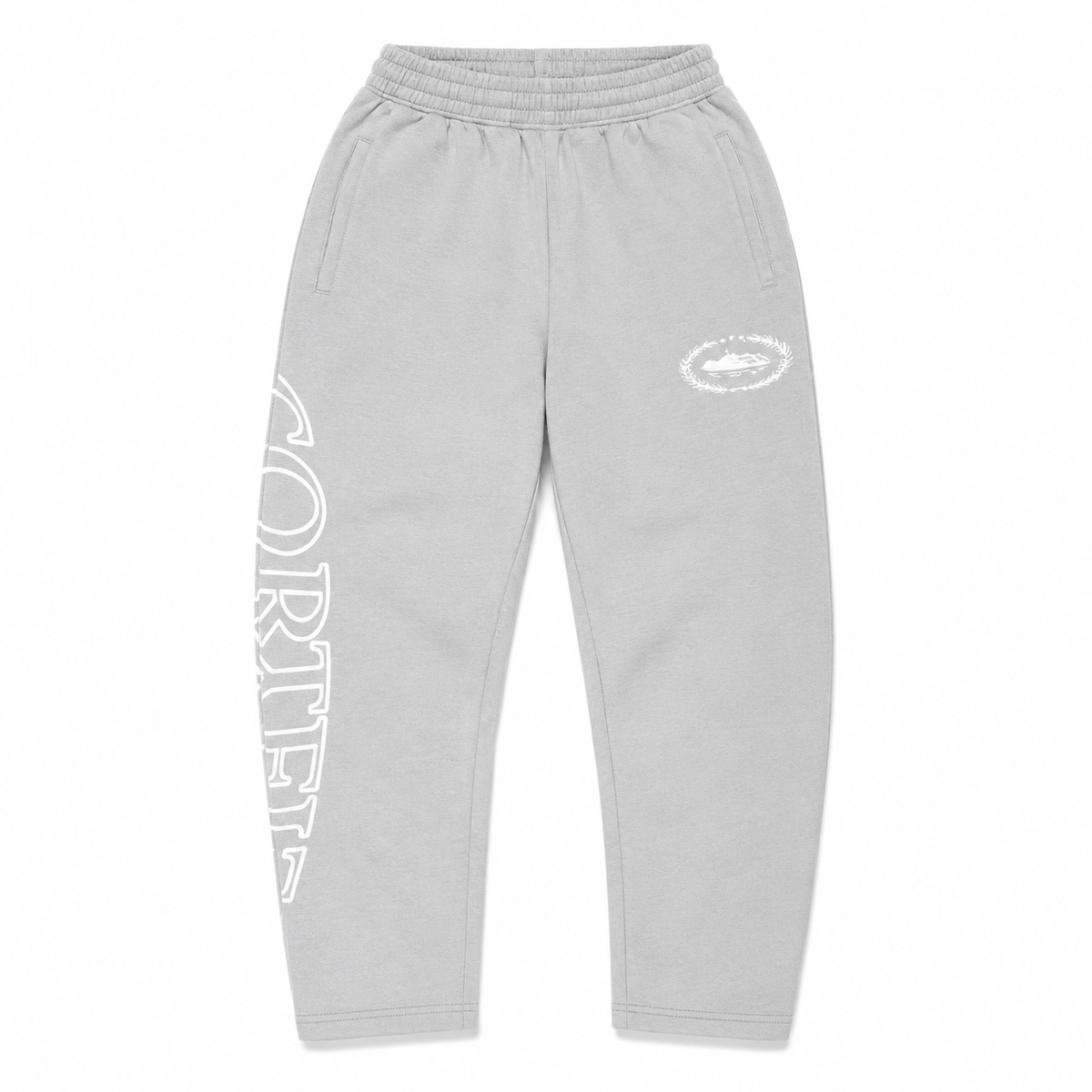 Light gray sweatpants with a white outlined vertical 'CORTEIZ' graphic on the left leg and a white circular logo on the right thigh, shown against a plain white background.