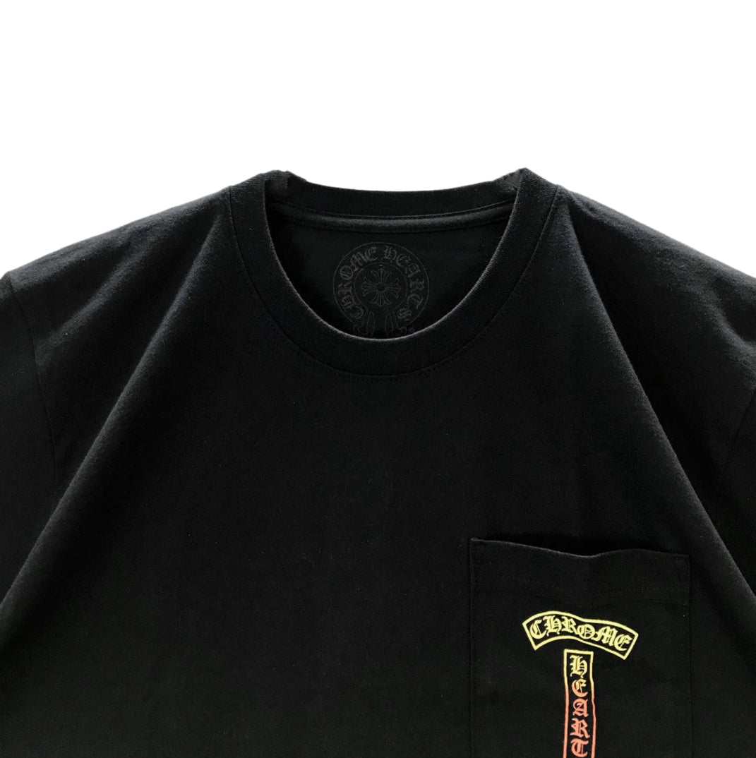 Black t-shirt with a logo on the chest pocket against a white background