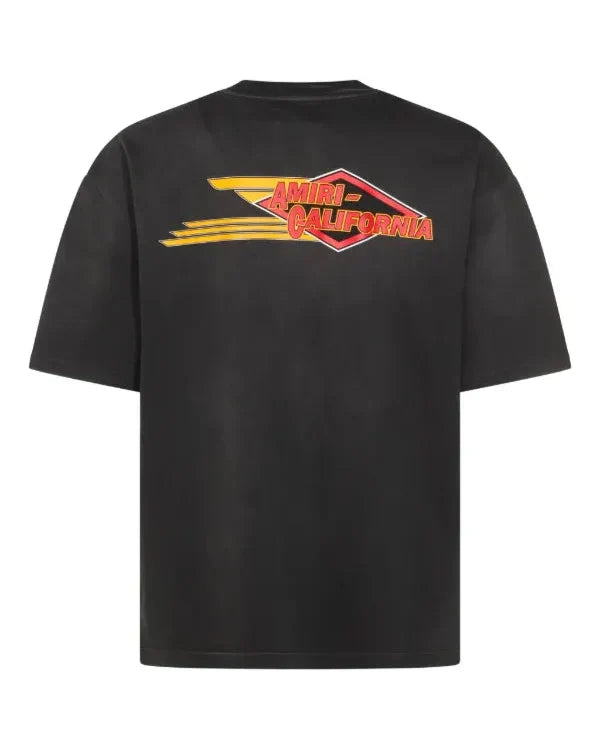 Black t-shirt with a graphic design on the back against a white background
