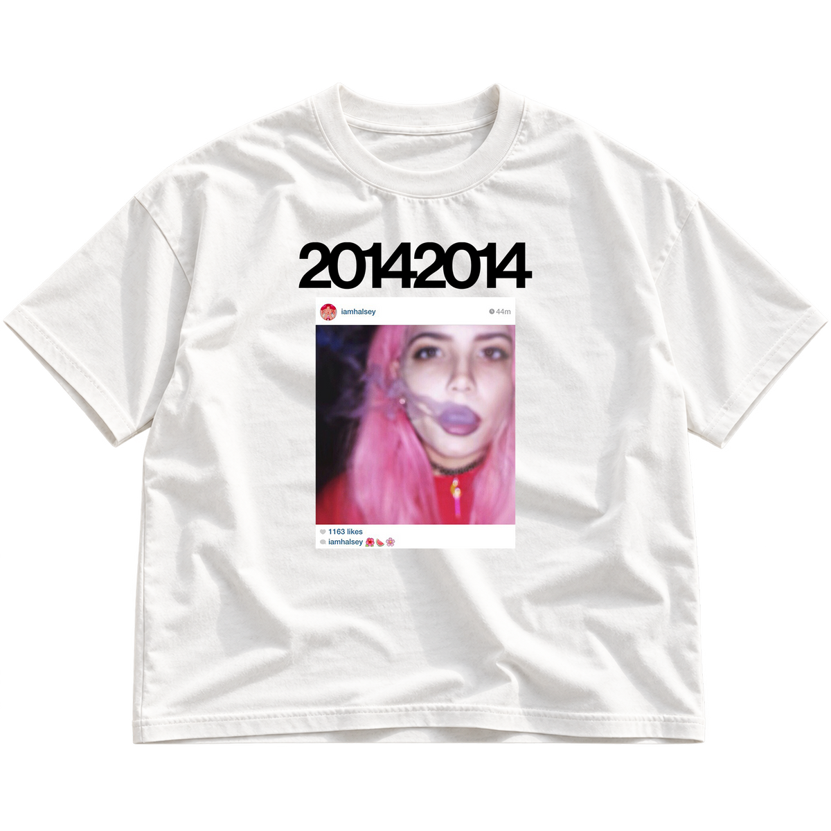A white short-sleeve crewneck t-shirt featuring a graphic print on the front. The print displays the text '20142014' in bold black font above a screenshot of an Instagram post with a pink-haired woman smoking a joint.