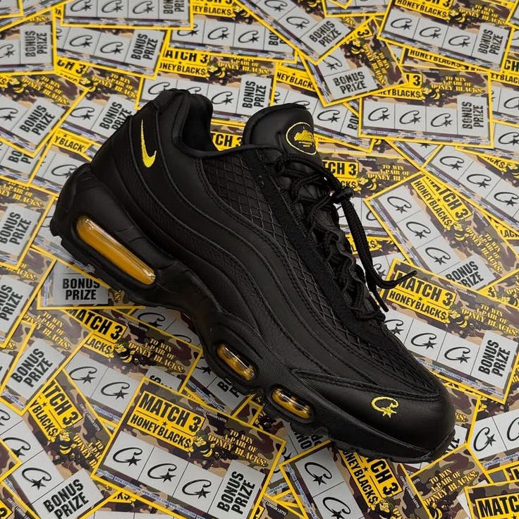 Black and yellow sneaker on a background of card game packaging