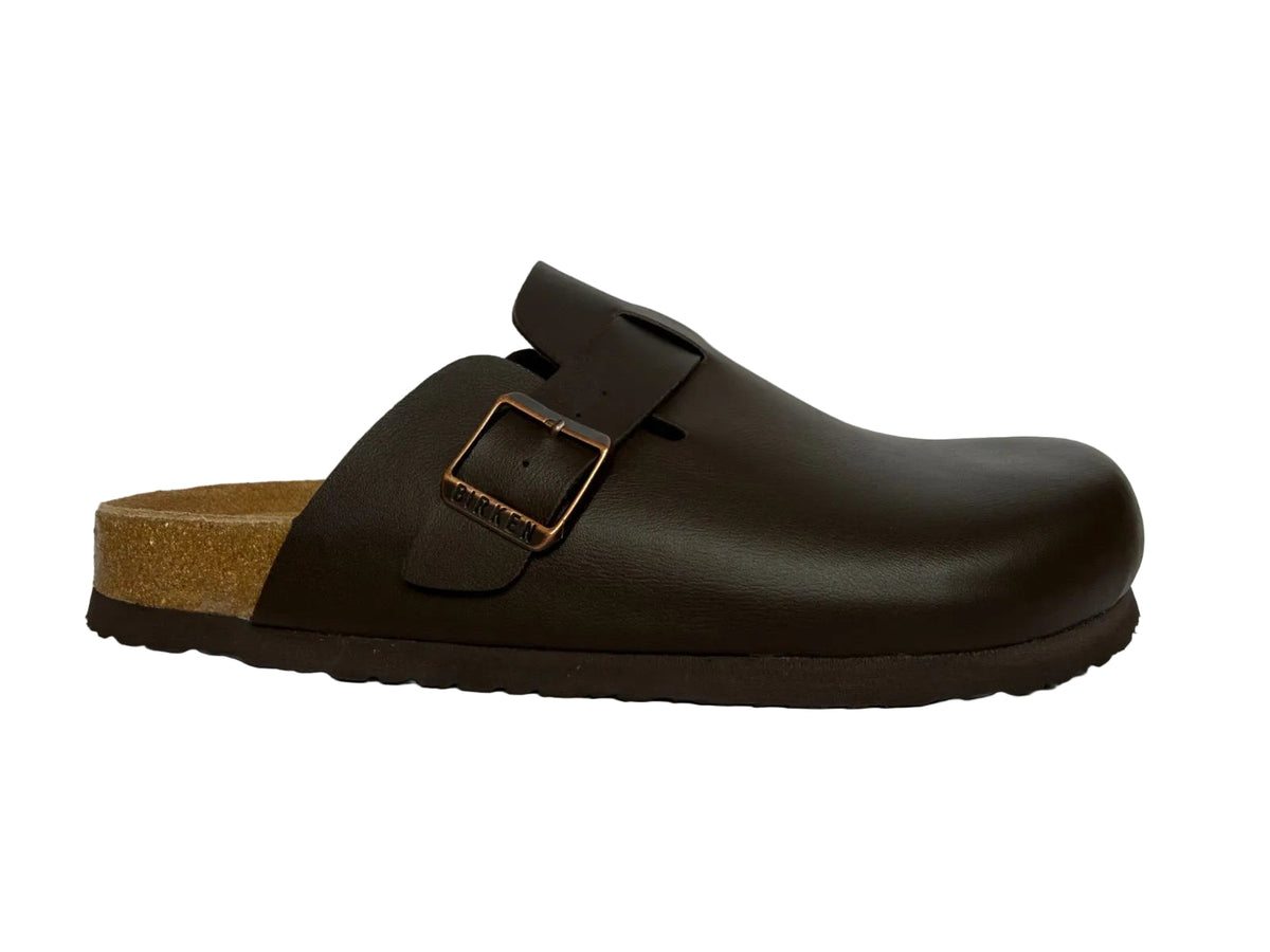 Brown leather clog shoe on a white background