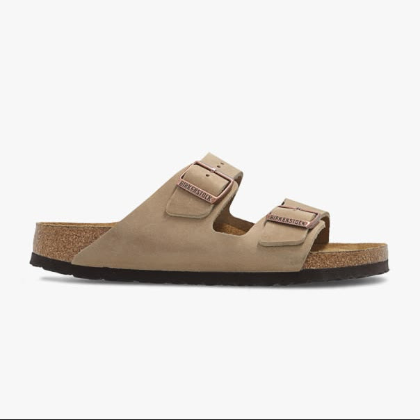 Brown sandal with cork sole on a white background