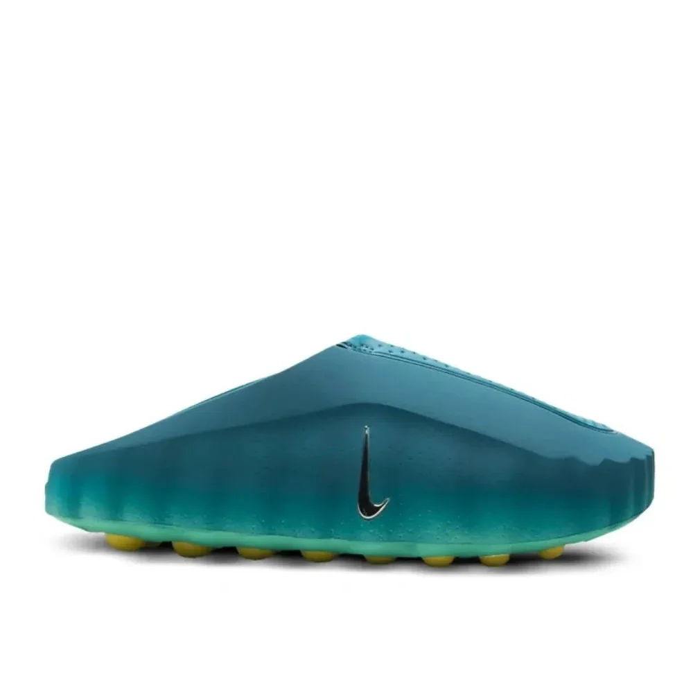 Teal sandal with a Nike logo on a white background